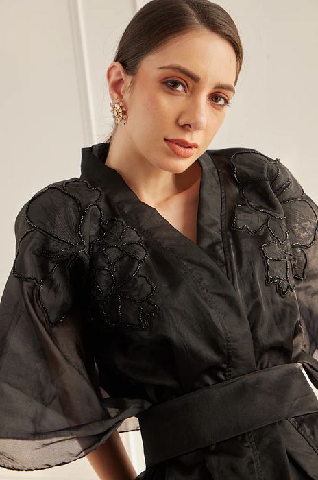 A model showcasing Black Sheer Set by Fuga Clothing from Fuga Clothing's collection A model showcasing Black Sheer Set by Fuga Clothing from Fuga Clothing's collection