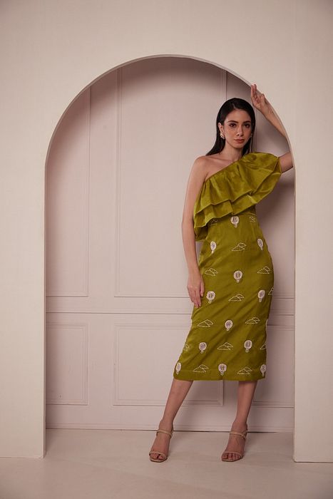 A model showcasing Pear Ruffled Dress by Fuga Clothing from Fuga Clothing's collection