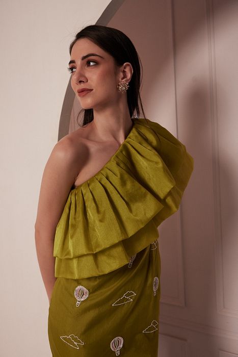 A model showcasing Pear Ruffled Dress by Fuga Clothing from Fuga Clothing's collection