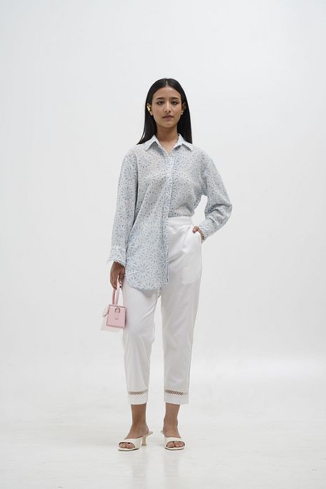 A model showcasing Mia Quirky Embroidery Shirt by Stitch Stories from Stitch Stories's collection