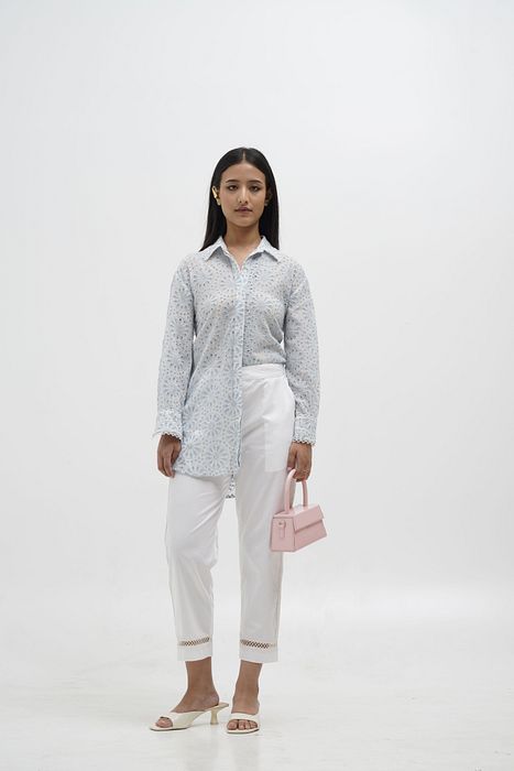 A model showcasing Mia Quirky Embroidery Shirt by Stitch Stories from Stitch Stories's collection