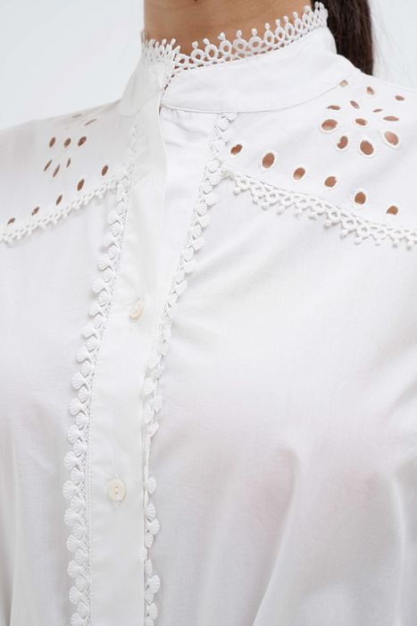 A model showcasing Dove Puffed Sleeve Dress by Stitch Stories from Stitch Stories's collection