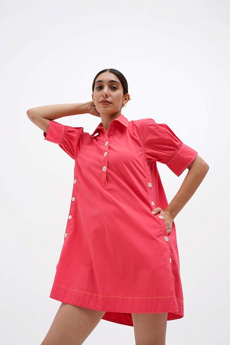 A model showcasing Madeline Dress by Stitch Stories from Stitch Stories's collection