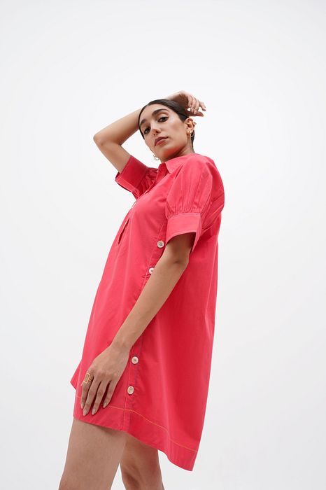 A model showcasing Madeline Dress by Stitch Stories from Stitch Stories's collection