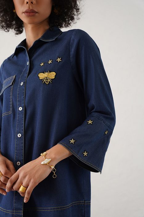 A model showcasing Grazia Shirt by Stitch Stories from Stitch Stories's collection