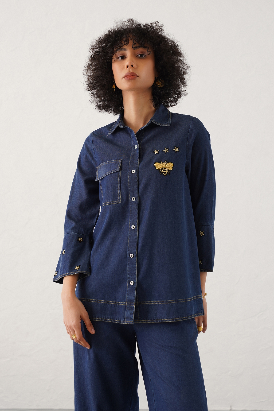 A model showcasing Grazia Shirt Feature image by Stitch Stories from Stitch Stories's collection