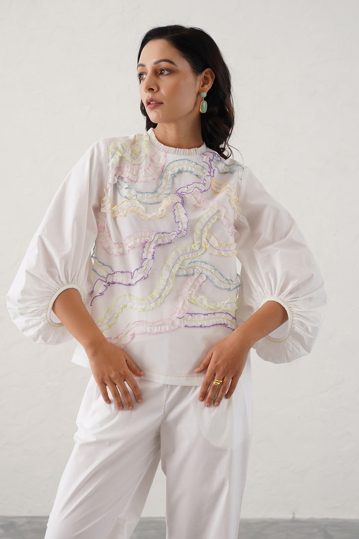 A model showcasing Stella Top Feature image by Stitch Stories from Stitch Stories's collection