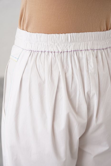 A model showcasing Stella Pant by Stitch Stories from Stitch Stories's collection