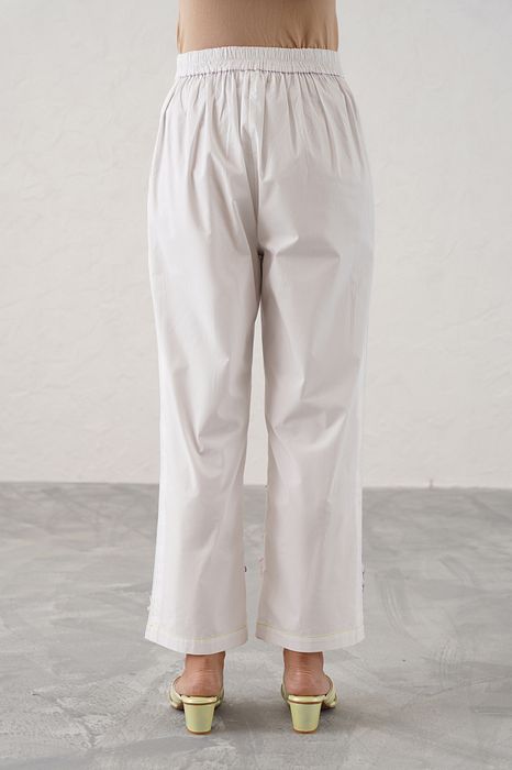 A model showcasing Stella Pant by Stitch Stories from Stitch Stories's collection