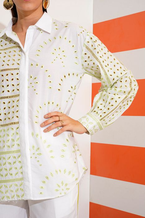 A model showcasing Cleo Shirt With Cut Work Embroidery by Stitch Stories from Stitch Stories's collection