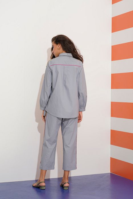 A model showcasing Savannah Pant by Stitch Stories from Stitch Stories's collection A model showcasing Savannah Pant by Stitch Stories from Stitch Stories's collection