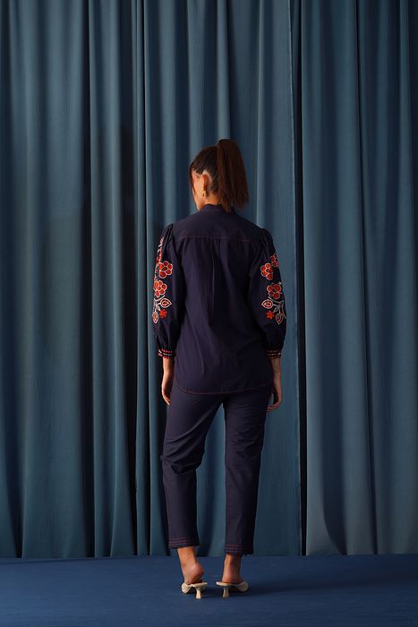 A model showcasing Daisy Embroidered Shirt by Stitch Stories from Stitch Stories's collection