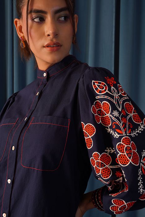A model showcasing Daisy Embroidered Shirt by Stitch Stories from Stitch Stories's collection
