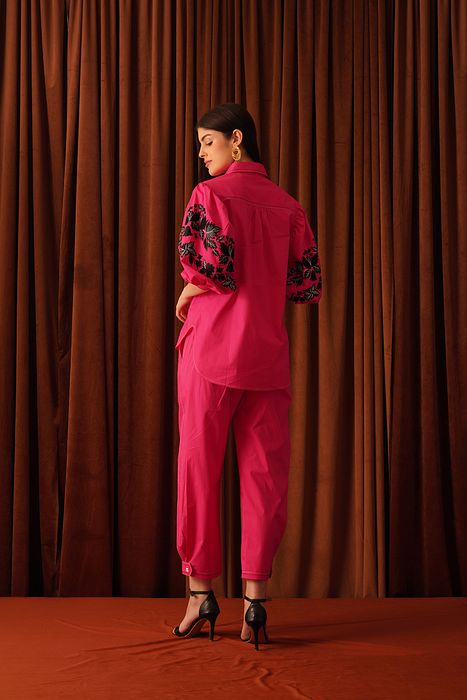 A model showcasing Raine Shirt by Stitch Stories from Stitch Stories's collection
