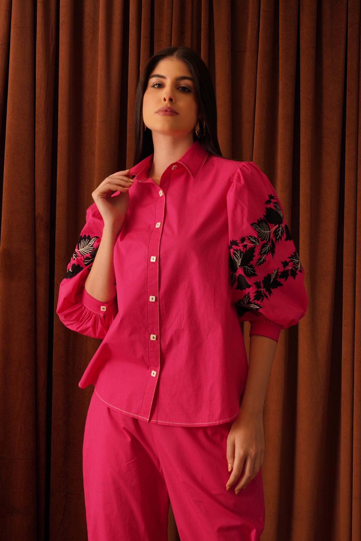 A model showcasing Raine Shirt Feature image by Stitch Stories from Stitch Stories's collection