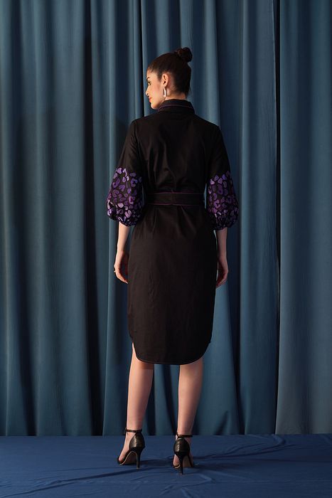 A model showcasing Oomph Dress by Stitch Stories from Stitch Stories's collection