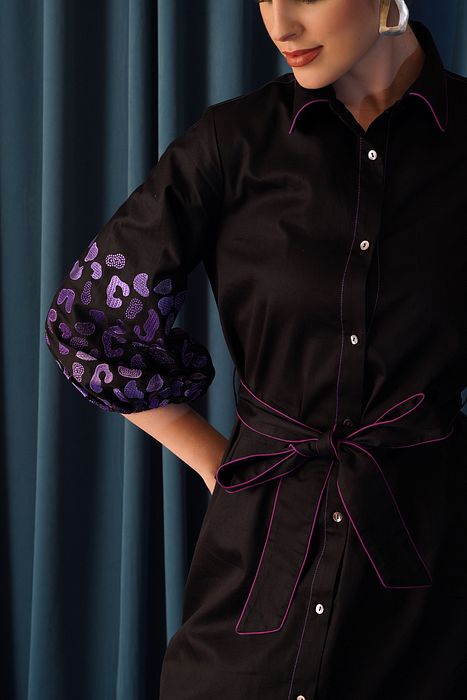 A model showcasing Oomph Dress by Stitch Stories from Stitch Stories's collection