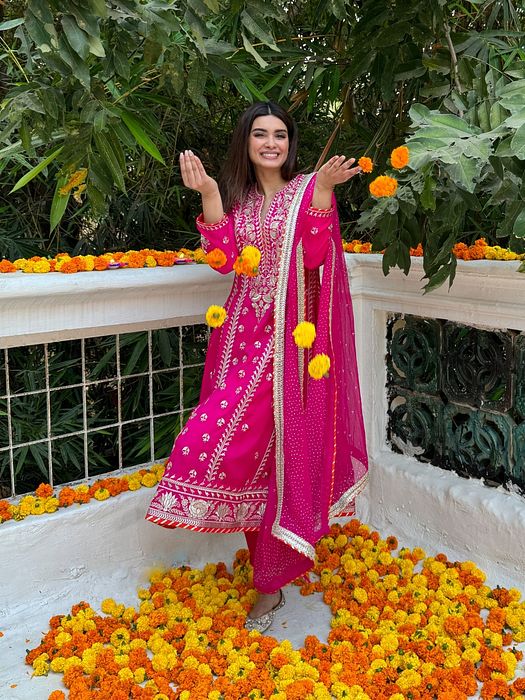 A model showcasing Diana Penty In Rani Pink Aarohi Anarkali Set by Gopi Vaid from Gopi Vaid's collection