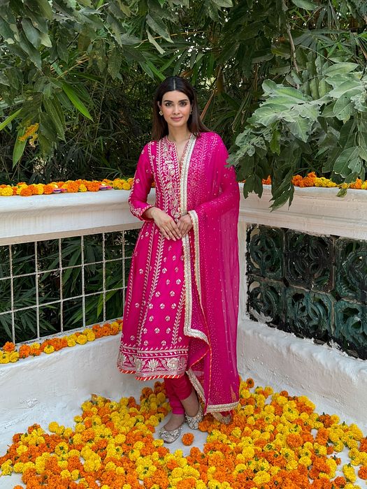 A model showcasing Diana Penty In Rani Pink Aarohi Anarkali Set by Gopi Vaid from Gopi Vaid's collection