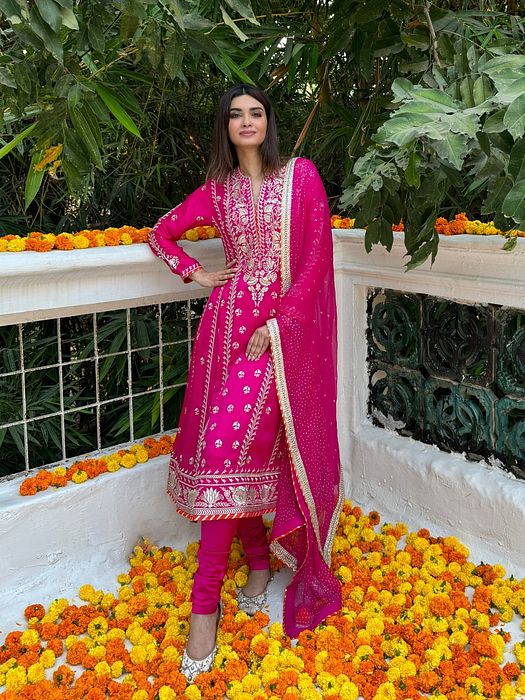 A model showcasing Diana Penty In Rani Pink Aarohi Anarkali Set by Gopi Vaid from Gopi Vaid's collection