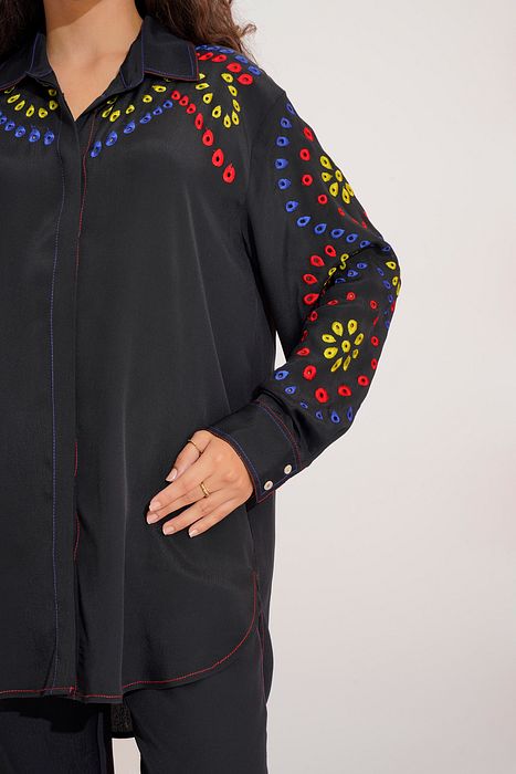 A model showcasing Octavia Embroidered Shirt by Stitch Stories from Stitch Stories's collection