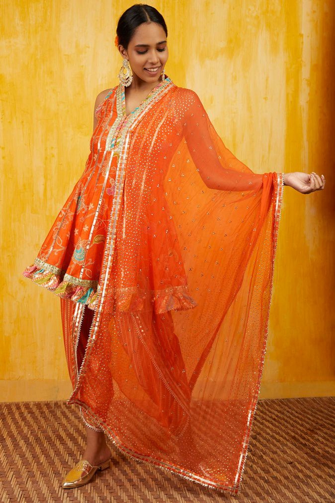 A model showcasing Marigold Garden Sleeveless Ag Dhoti Set Feature image by Gopi Vaid from Gopi Vaid's collection