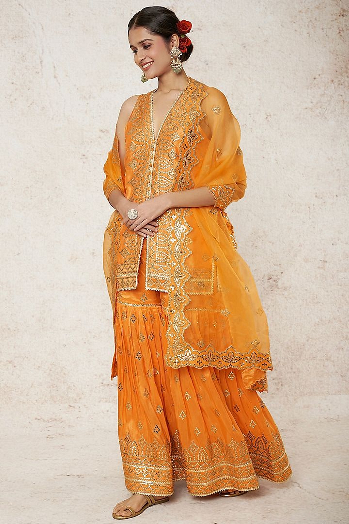 A model showcasing Rakhi Seeveless Kurta With Sharara And Dupatta Feature image by Gopi Vaid from Gopi Vaid's collection