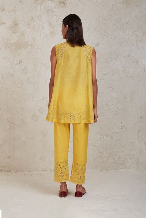 A model showcasing Yellow Ifza Coordinate Set by Sue Mue from Sue Mue's collection