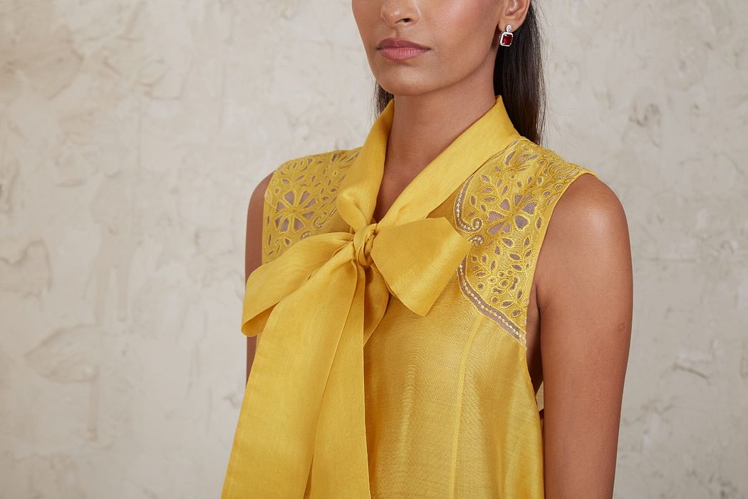 A model showcasing Yellow Ifza Coordinate Set by Sue Mue from Sue Mue's collection