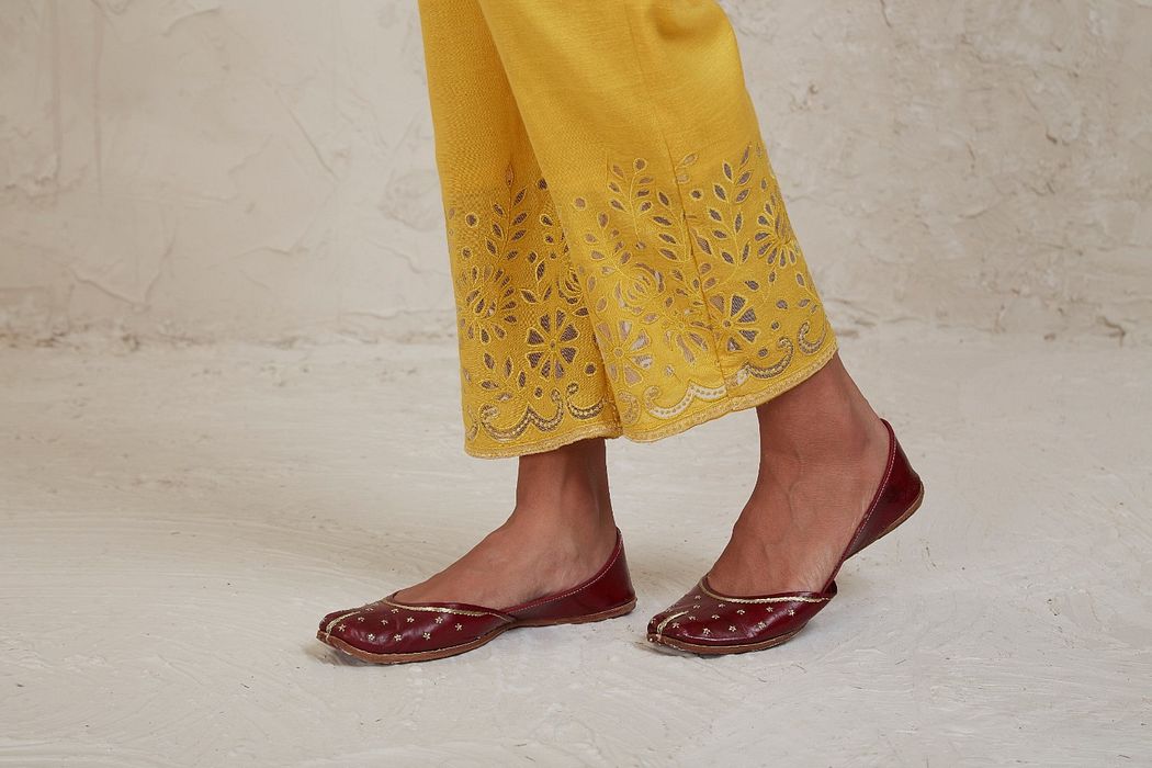 A model showcasing Yellow Ifza Coordinate Set by Sue Mue from Sue Mue's collection