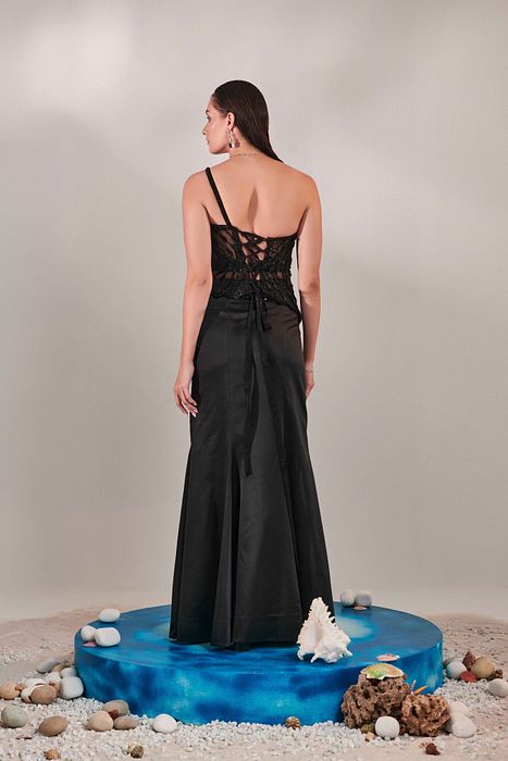 A model showcasing Corset Top And Skirt Set by One Knot One from One Knot One's collection