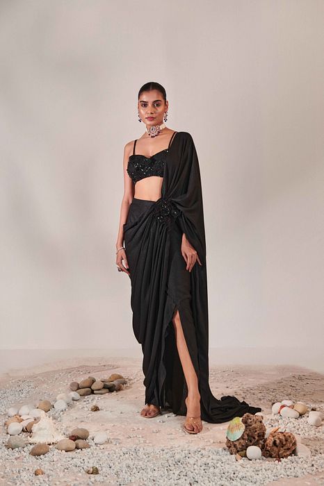 A model showcasing Fuss Free Pre Stitched Drape Saree by One Knot One from One Knot One's collection