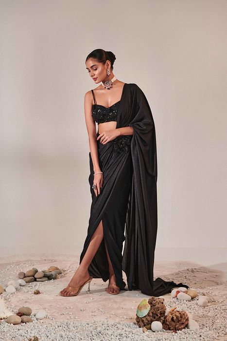 A model showcasing Fuss Free Pre Stitched Drape Saree by One Knot One from One Knot One's collection