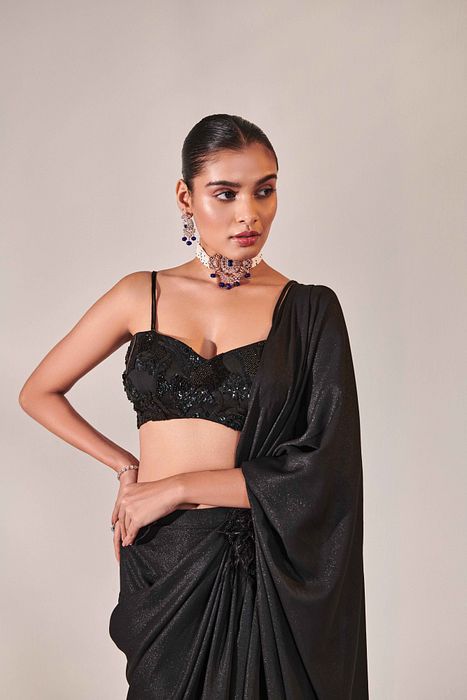 A model showcasing Fuss Free Pre Stitched Drape Saree by One Knot One from One Knot One's collection
