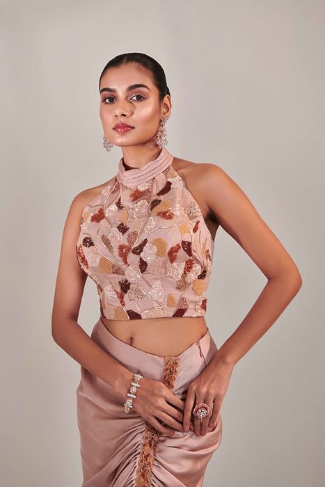 A model showcasing Nudish Pink Skirt Set by One Knot One from One Knot One's collection