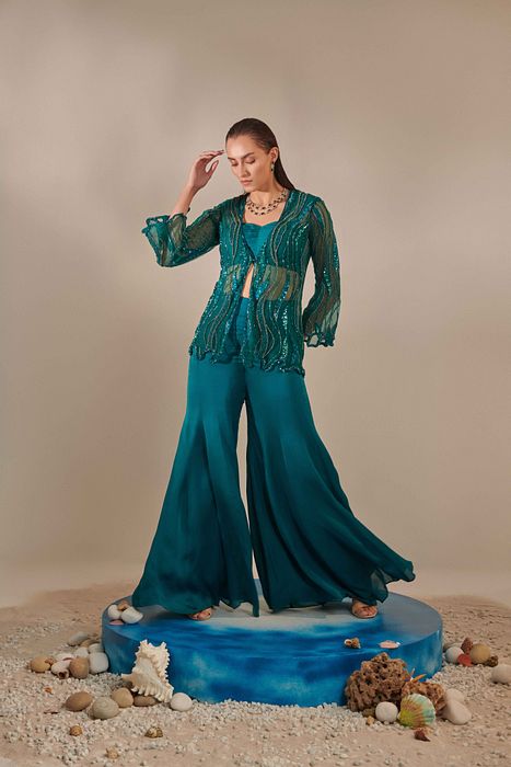 A model showcasing Teal Cutwork Jacket Set by One Knot One from One Knot One's collection