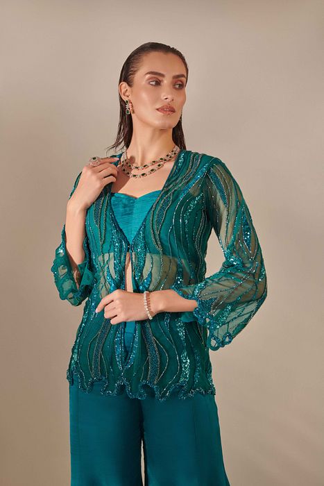 A model showcasing Teal Cutwork Jacket Set by One Knot One from One Knot One's collection