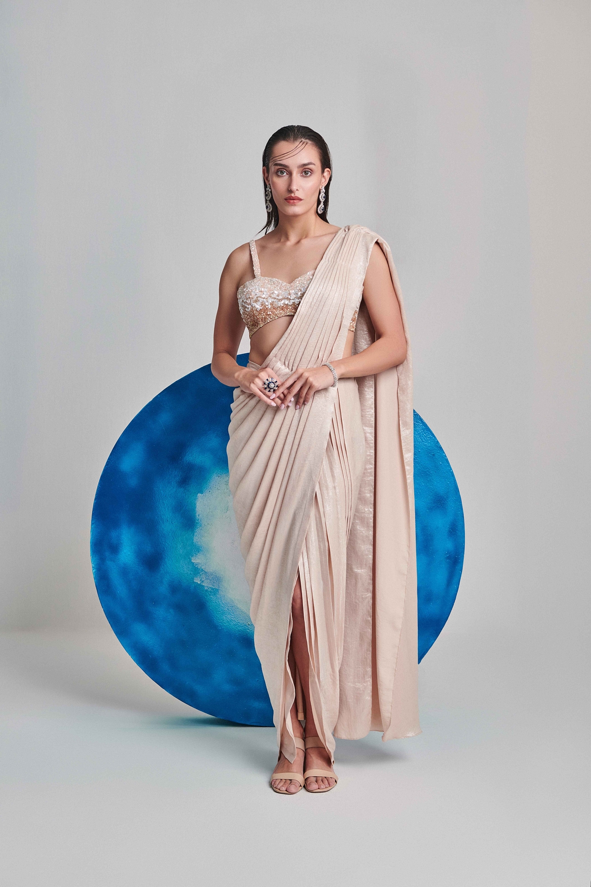 A model showcasing Ivory Pre Stitch Drape Saree Feature image by One Knot One from One Knot One's collection