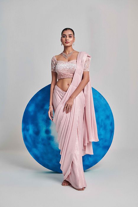 A model showcasing Soft Pink Ombre Pre Stitch Drape Saree by One Knot One from One Knot One's collection