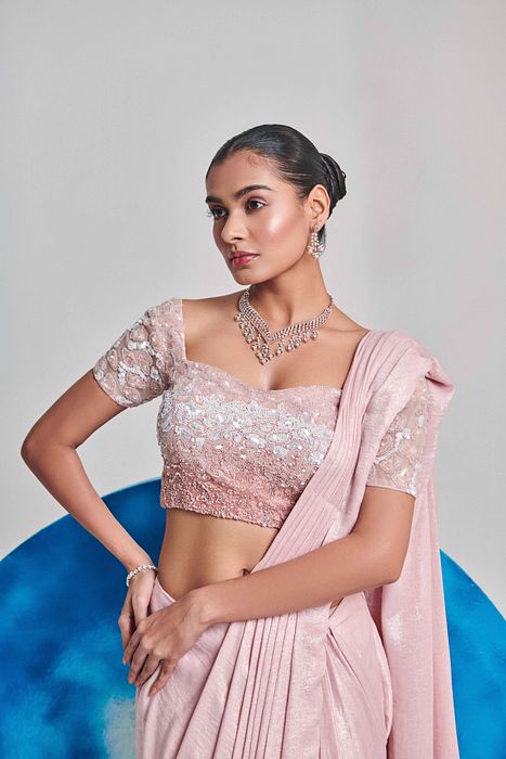 A model showcasing Soft Pink Ombre Pre Stitch Drape Saree by One Knot One from One Knot One's collection