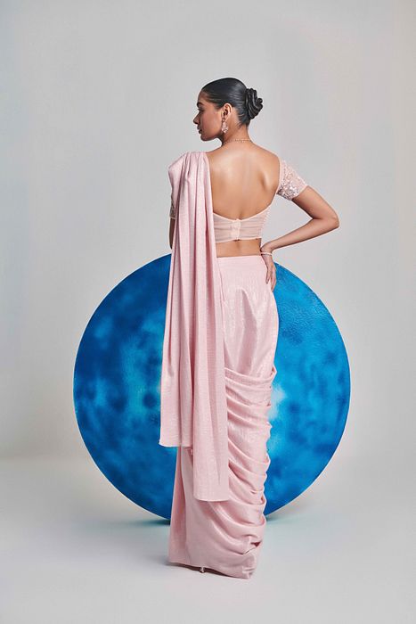 A model showcasing Soft Pink Ombre Pre Stitch Drape Saree by One Knot One from One Knot One's collection