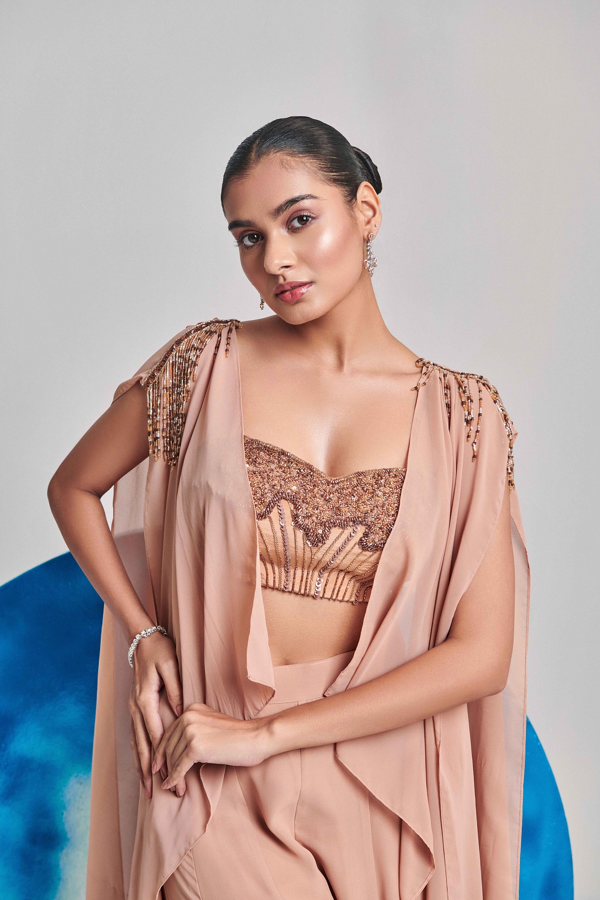 A model showcasing Beige Cape And Sharara Set Feature image by One Knot One from One Knot One's collection