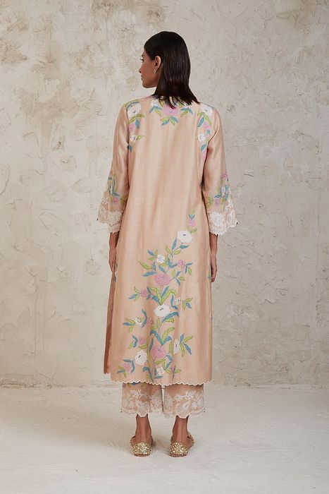 A model showcasing Aima Beige A Line Kurta Set by Sue Mue from Sue Mue's collection