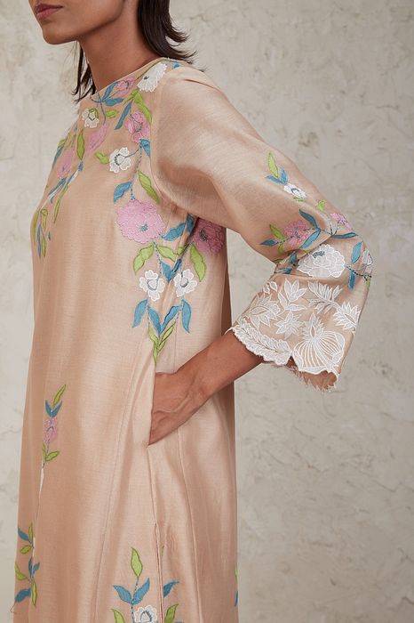 A model showcasing Aima Beige A Line Kurta Set by Sue Mue from Sue Mue's collection