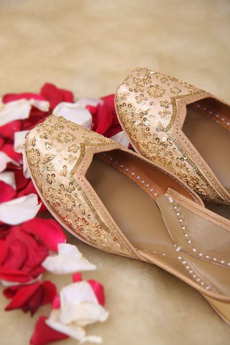 A model showcasing Golden Blooms Sequin Shines by Farozaan from Farozaan's collection