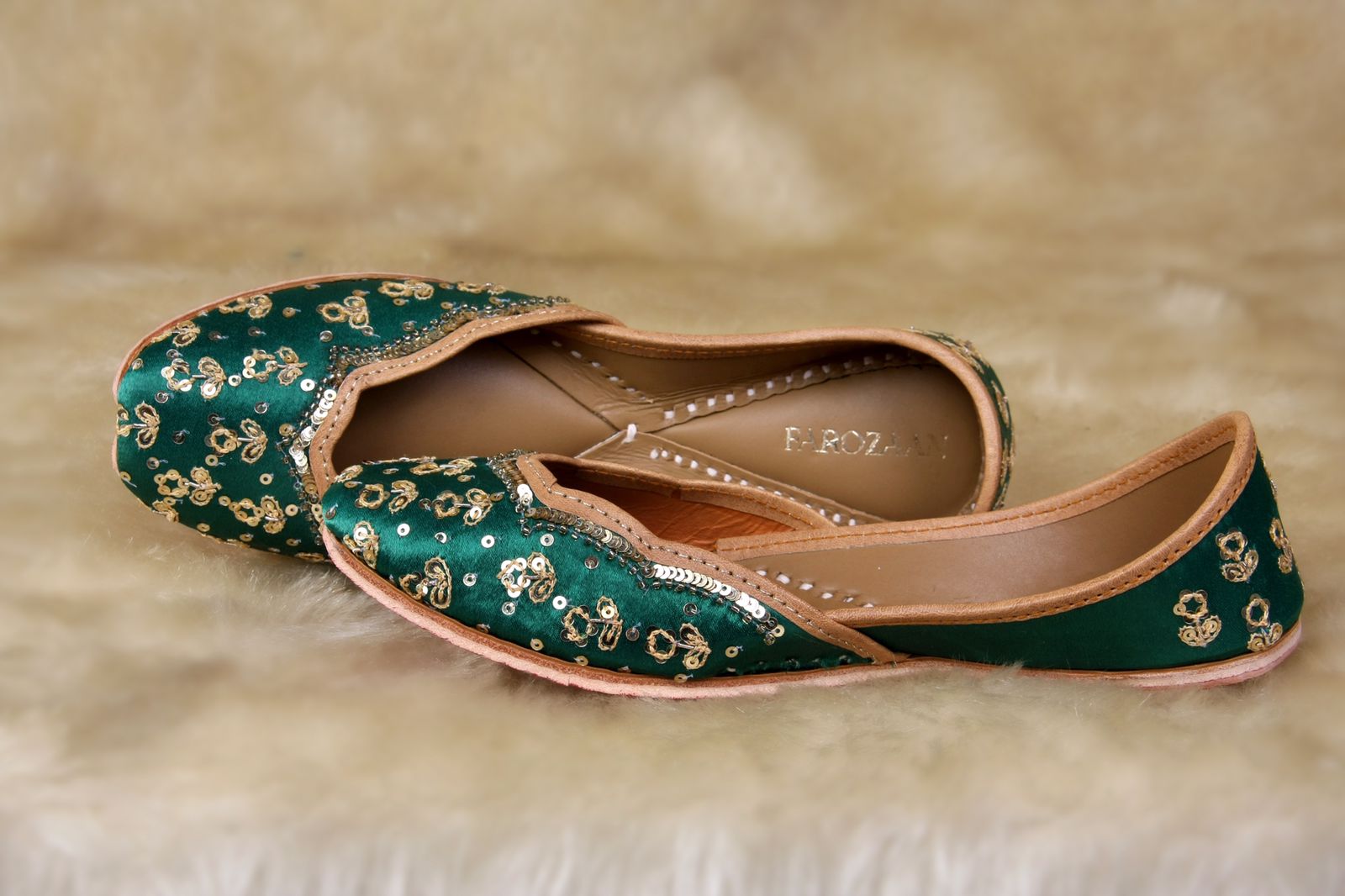 A model showcasing Emerland Glow Golden Flow by Farozaan from Farozaan's collection