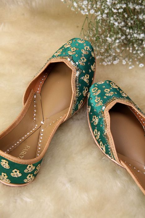 A model showcasing Emerland Glow Golden Flow by Farozaan from Farozaan's collection