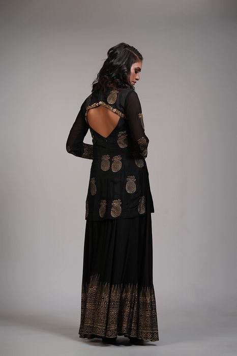 A model showcasing Ananaas Hand Block Printed Sharara Set In Silk by Shruti S Label from Shruti S Label's collection