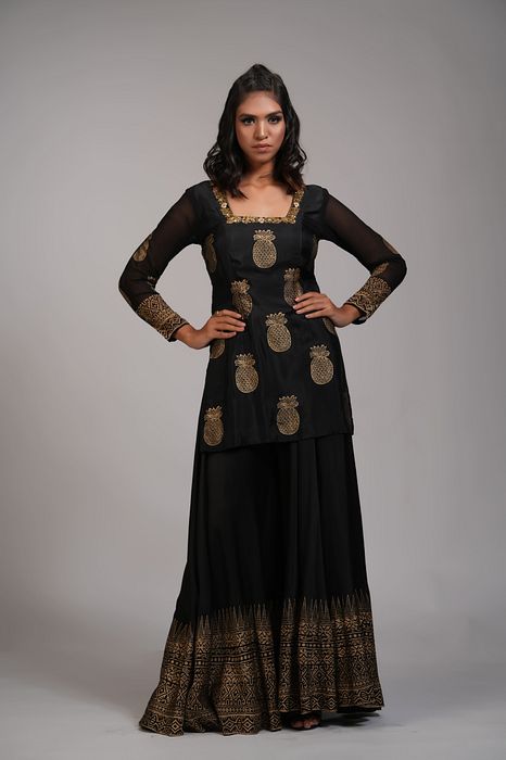 A model showcasing Ananaas Hand Block Printed Sharara Set In Silk by Shruti S Label from Shruti S Label's collection