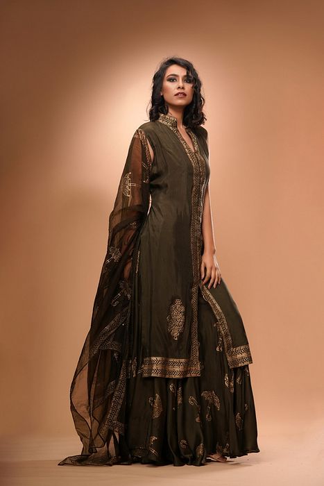 A model showcasing Metallic Print Sharara Set by Shruti S Label from Shruti S Label's collection